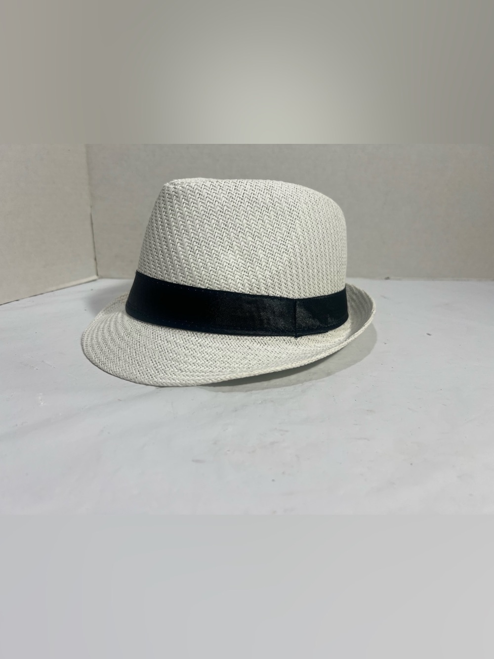 Stylish white with black band.